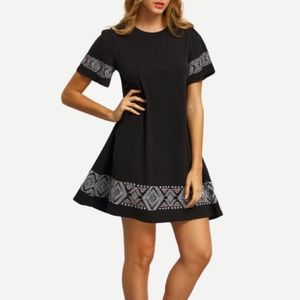 Black embroidered trim dress